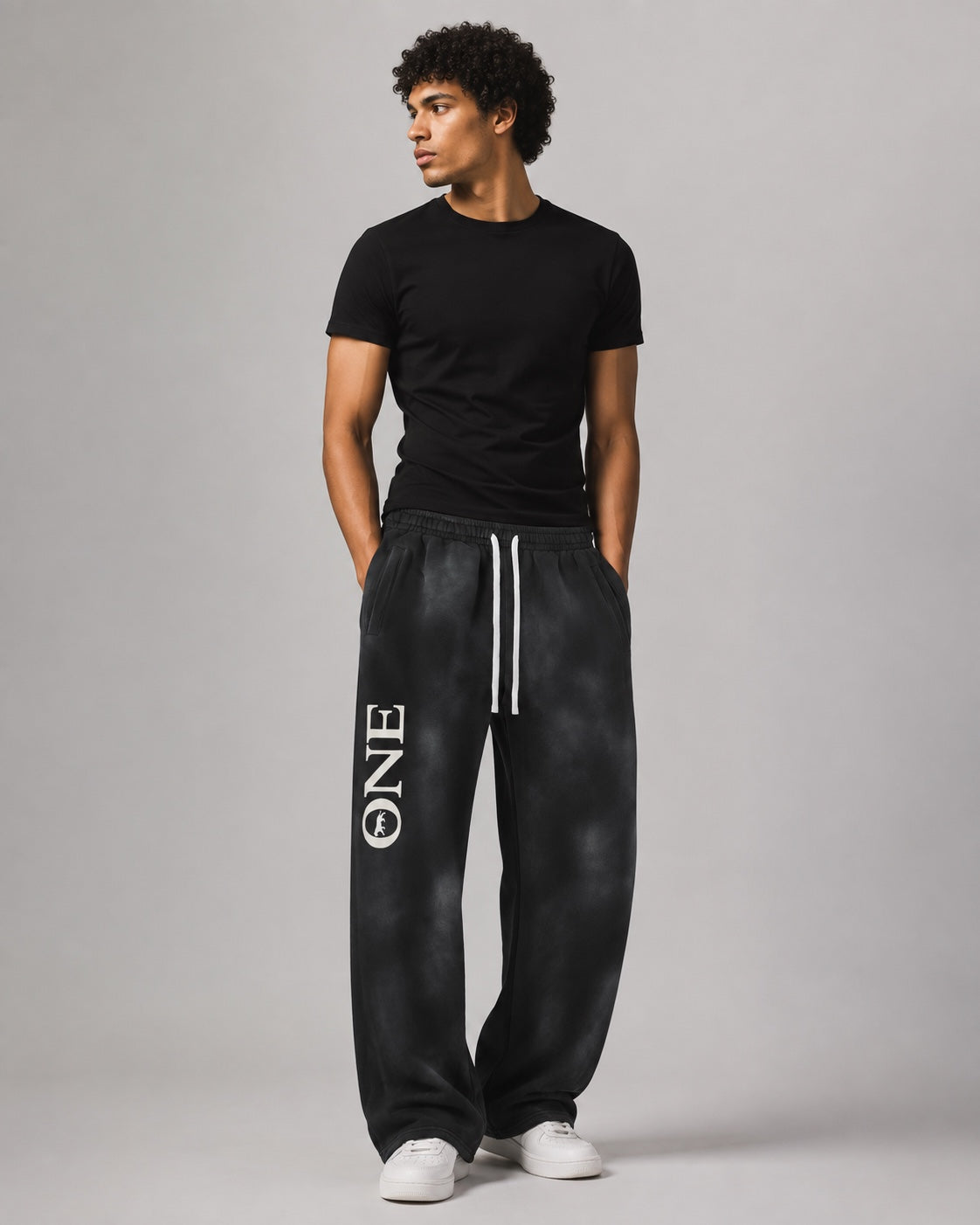 ONE Signature Sweatpant worn by male model front view